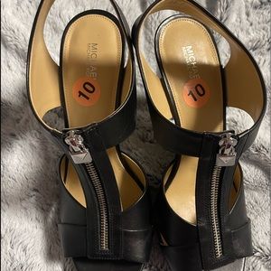 Brand new Michael Kors black heels never worn